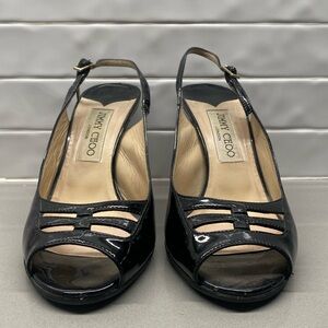 Patent leather 3.5 inch sling back heels.